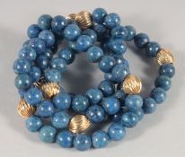A LAPIS AND GOLD BEAD NECKLACE. 72cm long.