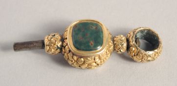 AN AMETHYST AND BLOODSTONE SET CLOCK KEY.