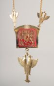 AN EGYPTIAN EAGLE PENDANT AND CHAIN.
