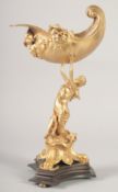 A GOOD GILT BRONZE LADY holding a shell comport. 14ins high.
