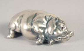 A RUSSIAN SILVER SLEEPING PIG. Marks: Head 84, Eagle. Faberge I. P. 2.75ins long, 43gms.