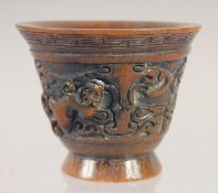 A HORN STYLE LIBATIONS CUP.