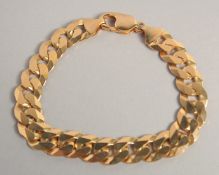 A 9CT GOLD BRACELET. 28gms.
