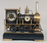 A GOOD BRONZE TRAIN CLOCK on a stand with three dials. 16ins long.