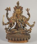 A GILT BRONZE BUDDHA with eight arms, set with stones.