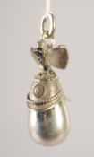 A RUSSIAN SILVER HELMET AND EGG PENDANT.