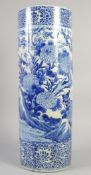 A JAPANESE BLUE AND WHITE STICK STAND. 24ins high.