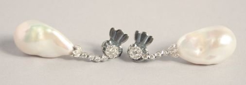 A PAIR OF 18CT WHITE GOLD LARGE DROP PEARL AND DIAMOND EARRINGS with gemological certificate.