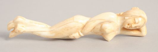 A CARVED BONE DOCTOR'S FIGURE. 5ins diameter.