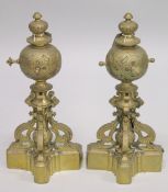 A GOOD PAIR OF 19TH CENTURY CAST BRASS CHENETS with three scrolling supports and base. 1ft 5ins