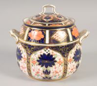 A ROYAL CROWN DERBY LARGE TWO HANDLED COVERED JAR painted in pattern 1128, date mark 1925.