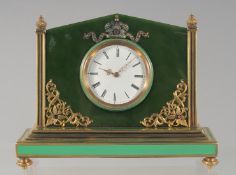 A GOOD RUSSIAN SILVER GILT AND JADE SMALL MANTLE OR DESK CLOCK. Mark: Head 84, Faberge H. W. 14cm