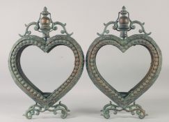 A PAIR OF COPPER HEART SHAPED LANTERNS. 20ins high.