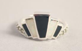A SILVER ART DECO DESIGN ONYX, OPAL AND MARCASITE RING.
