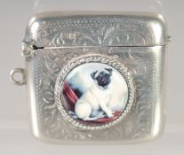 AN EDWARD VII SILVER VESTA CASE with an oval enamel of a pug dog. 1.5ins x 1.25ins. Chester 1918.