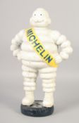 A CAST IRON MICHELIN MAN. 16ins high.