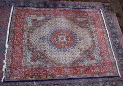 A GOOD PERSIAN CARPET, cream ground with stylised all over floral decoration. 8' x 6'5