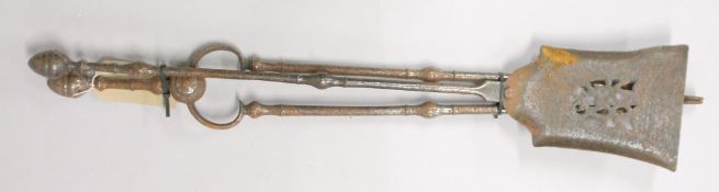 A PAIR OF STEEL FIRE IRONS