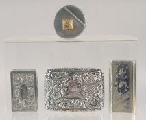 THREE WHITE METAL SNUFF BOXES AND A ROUND SNUFF BOX. (4).