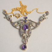 A 9CT GOLD AND SILVER AMETHYST AND DIAMOND NECKLACE.