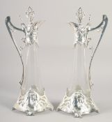 A GOOD PAIR OF W.A.P. PLATE AND GLASS TAPERING CLARET JUGS. 20ins high.