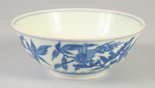 A CHINESE BLUE AND WHITE PORCELAIN BOWL with floral decoration and birds, six character mark to