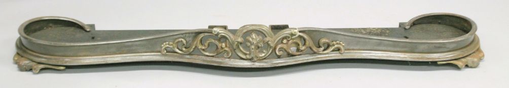 A 19TH CENTURY STEEL SERPENTINE FRONTED FENDER. 5ft long, 1ft deep.