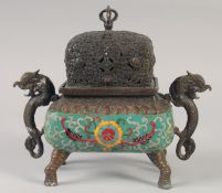 A CHINESE BRONZE TWIN HANDLED CENSER AND COVER with cloisonne decoration and raised on four elephant