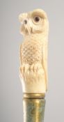A WALKING STICK with carved bone handle 
