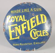 A ROYAL ENFIELD CYCLES ENAMEL SIGN. 11.5ins diameter.
