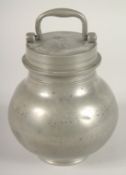 AN 18TH CENTURY FRENCH PEWTER BULBOUS CAN AND COVER with carrying handles. bears Paris scene. 7ins