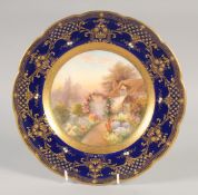 A ROYAL WORCESTER SUPERB PLATE painted with an English cottage having a floriferous garden ,the