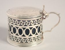 A VICTORIAN CIRCULAR PIERCED MUSTARD POT AND COVER with handles and sapphire blue liner.