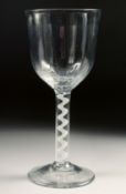 A LARGE 18TH CENTURY WINE GLASS with air twist stem. 7.25ins high.