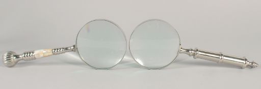TWO MAGNIFYING GLASSES with mother of pearl and chrome handle.