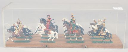A DIECAST SET, of twelve mounted cavalry, in a Perspex case.