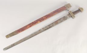 A REPLICA OF A VIKING SWORD, early 20th century, wide straight triple fullered blunt 32.5 in blade