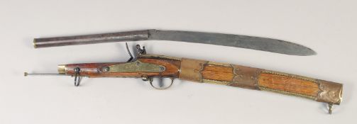 A RARE INDIAN TORODAR FLINTLOCK CARBINE, early 19th century, round 10in barrel with brass ring at