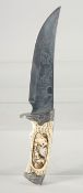 A KNIFE WITH A STAINLESS STEEL BLADE, engraved with a fox and cubs with antler handle carved and