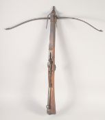 AN ENGLISH STONE BOW, circa 1770, beech stocked with iron mounts, iron bow, folding fore sight,