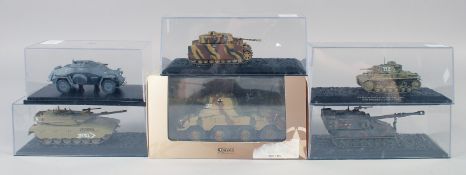 SIX VARIOUS ARMORED VEHICLES, boxed.