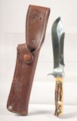 A PUMA WHITE HUNTER II 6377 PUMASTER STEEL, with antler handle, 10.5
