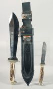 ORIGINAL-PUMA-WAIDBLATT KINFE AND PUMA KLEINER JAGDNICKER KNIFE, both with antler handles 12.5