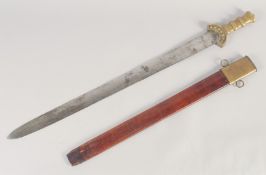 A THEATRICAL REPLICA OF AN IRON AGE SWORD, early 20th century, wide straight pointed 28.5 in blade
