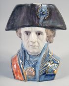 A DELFT POTTERY MASK JUG, 