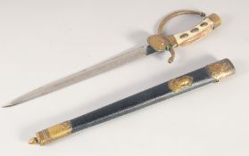 A GERMAN HUNTING DIRK, late 19th century, straight single edged engraved blade, oak leaf shell