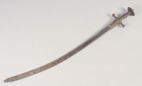 AN INDIAN TULWAR, mid-18th century, 28in fullered blade and typical hilt, overall rusted.