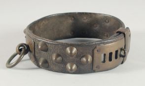 A 17th CENTURY LEATHER STUDDED BRASS DOG COLLAR, with six brass settings, stamped, possibly
