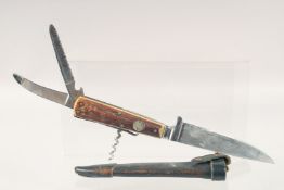 A KNIFE, the antler handle with corkscrew and two knives, in a leather sheath, 8.5