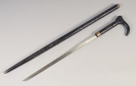 A JAPANESE SWORD STICK, late19th century, single edged 16in sword blade, in foliate carved cane